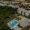 Resort-style swimming pool with lounge seating