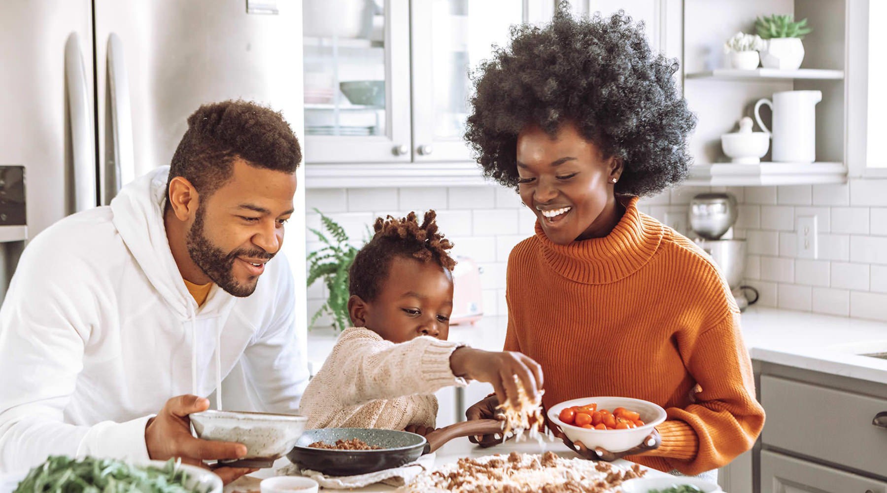 a family cooking together A perfect fit for the whole family